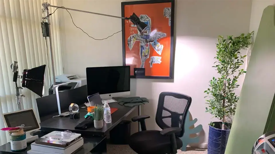 Front office workstations with computers that can be used as an additional shooting space